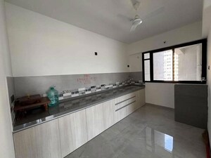 Kitchen in 2 BHK Apartment at Unique Youtopia, Kharadi – for Rent