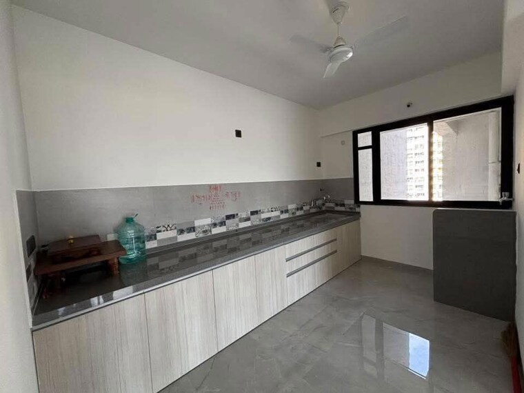 Kitchen, unique-youtopia 2 Bedroom 757 Sq.Ft. Apartment In Kharadi Pune 10222330