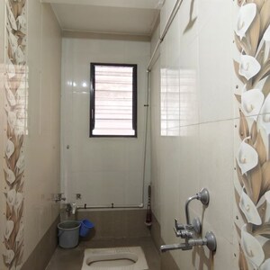 Bathroom in 2 BHK Apartment at Pimpri Gaon – for Sale