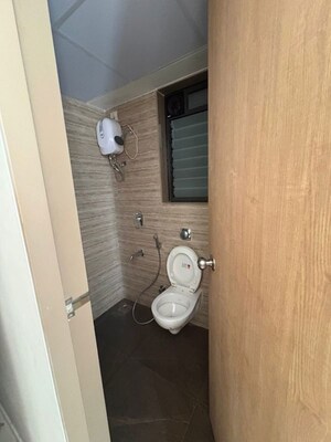 Bathroom in 1 BHK Apartment at Lodha Palava Crown, Dombivli East – for Rent