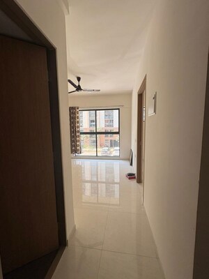 Living Room in 1 BHK Apartment at Lodha Palava Crown, Dombivli East – for Rent