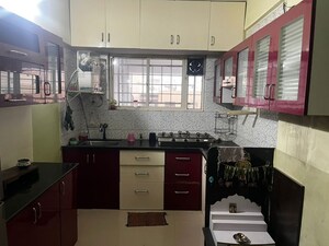 Kitchen in 2 BHK Apartment at Solitaire Co Op Housing Society Ltd, Dhanori – for Rent