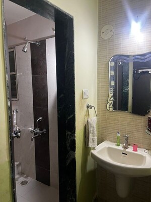 Bathroom in 2 BHK Apartment at Solitaire Co Op Housing Society Ltd, Dhanori – for Rent