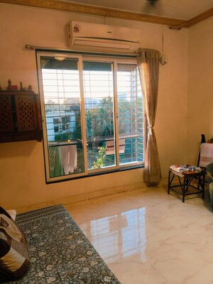 Living Room in 1 BHK Apartment at Shamik Elanza Santacruz, Vakola – for Rent