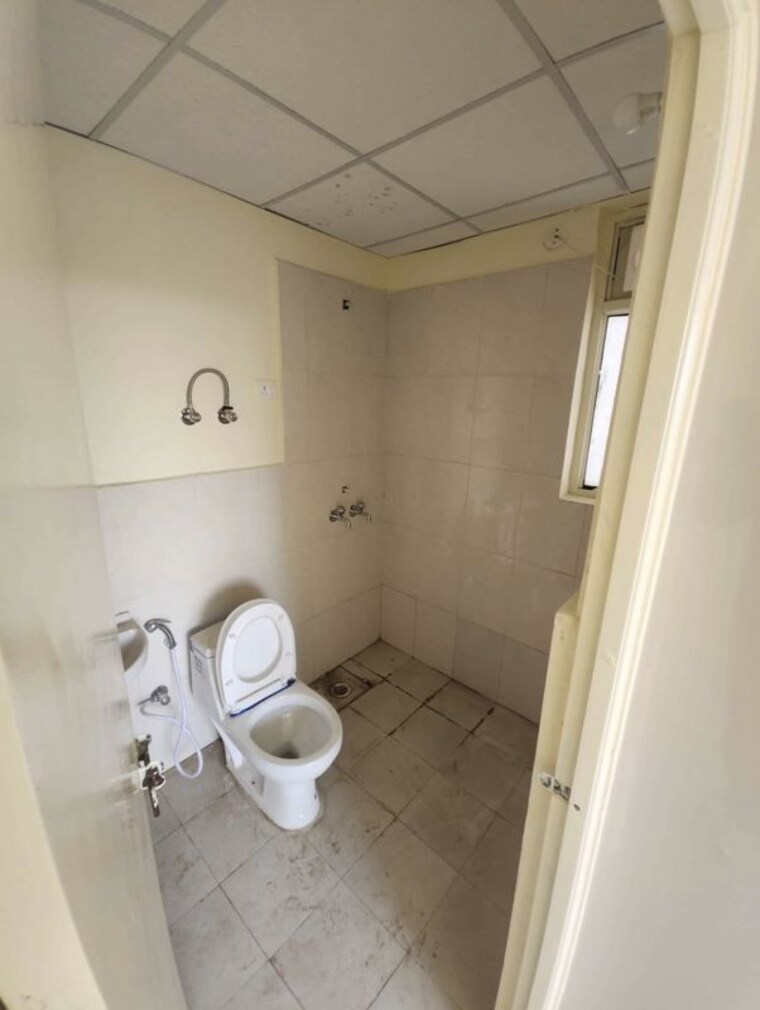 Bathroom, pyramid-midtown 2 Bedroom 600 Sq.Ft. Apartment In Sector 59 Gurgaon 10222649