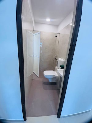 Bathroom in 1 BHK Apartment at Puranik Rumah Bali, Ghodbunder Road – for Sale