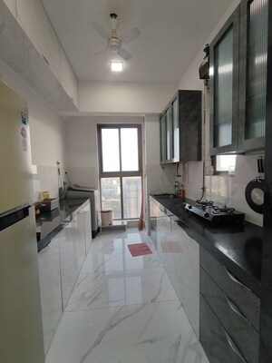 Kitchen in 2 BHK Apartment at Raymond Ten X Habitat, Pokhran Road No Two – for Rent