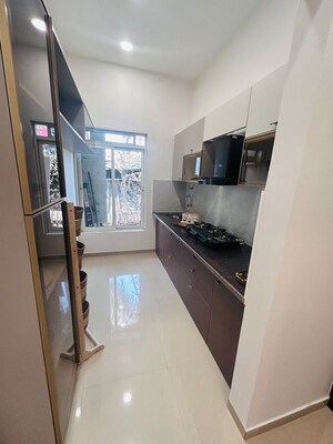 Kitchen in 1 BHK Apartment at Puranik Rumah Bali, Ghodbunder Road – for Sale
