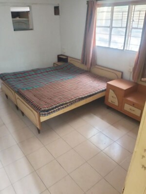 Bedroom in 2 BHK Apartment at Sai Dwarkamai CHS, Kondhwa – for Rent