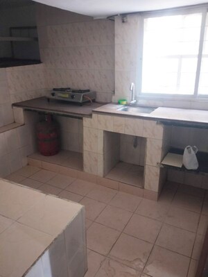 Kitchen in 2 BHK Apartment at Sai Dwarkamai CHS, Kondhwa – for Rent