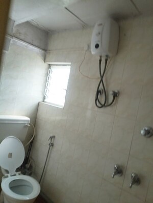Bathroom in 2 BHK Apartment at Sai Dwarkamai CHS, Kondhwa – for Rent