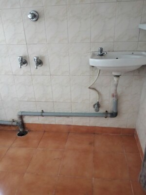 Bathroom in 2 BHK Apartment at Sai Dwarkamai CHS, Kondhwa – for Rent