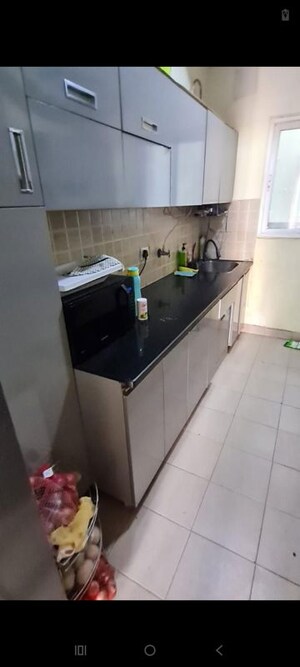 Kitchen in 2.5 BHK Apartment at Mahagun Moderne, Sector 78 – for Rent
