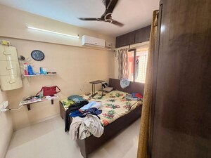 Bedroom in 2 BHK Apartment at Parshvanath Hansraj Height, Manpada – for Sale