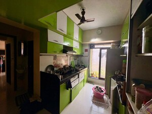 Kitchen in 2 BHK Apartment at Parshvanath Hansraj Height, Manpada – for Sale