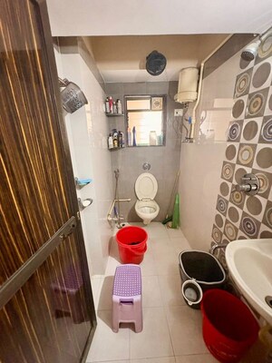 Bathroom in 2 BHK Apartment at Parshvanath Hansraj Height, Manpada – for Sale