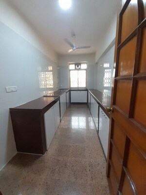 Kitchen in 3 BHK Apartment at Prabhat Apartment, Cumbala Hill – for Sale