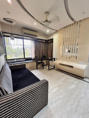 Living Room in 1 BHK Apartment at Bandra West – for Rent