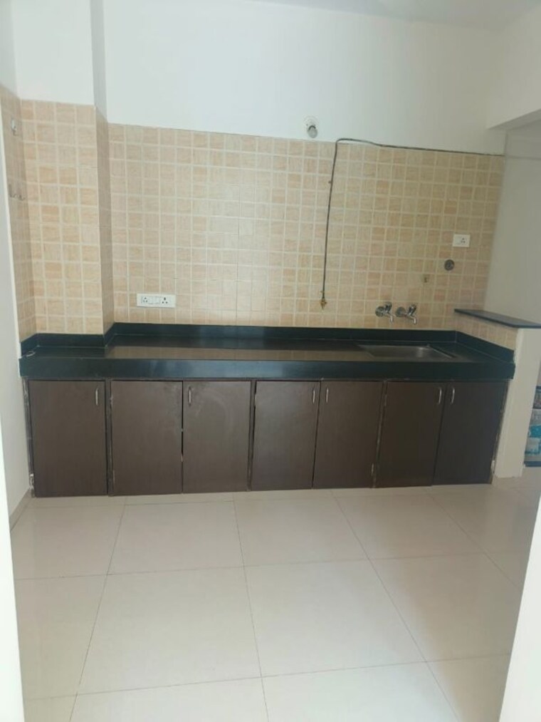 Kitchen, nyati-eternity-2-chs 1 Bedroom 690 Sq.Ft. Apartment In Undri Pune 10223023