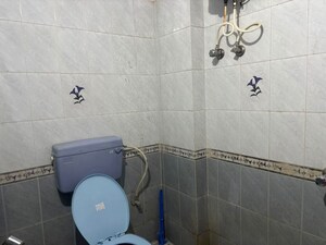 Bathroom in 3 BHK Apartment at Snehanjali Residency, Old Madras Road – for Rent