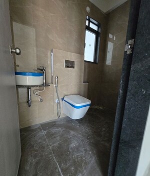 Bathroom in 2 BHK Apartment at Mahavir Square, Manpada – for Sale