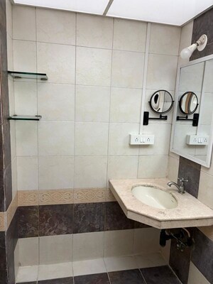 Bathroom in 3 BHK Apartment at Raj Classic, Andheri West – for Sale