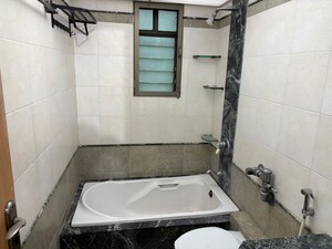 Bathroom in 3 BHK Apartment at Raj Classic, Andheri West – for Sale
