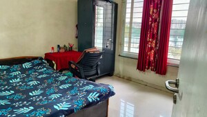 Bedroom in 2 BHK Apartment at Ganga Arcadia, Kharadi – for Rent