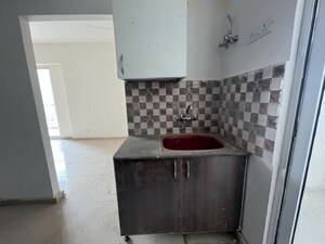 Kitchen in 2 BHK Apartment at Tech Zone 4 Greater Noida – for Rent