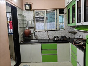 Kitchen in 2 BHK Apartment at Celebria Apartment, Hadapsar – for Rent