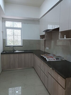 Kitchen in 2 BHK Apartment at Smart World Orchard, Sector 61 – for Rent