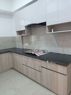 Kitchen in 2 BHK Apartment at Smart World Orchard, Sector 61 – for Rent