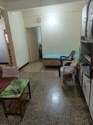 Living Room in 2 BHK Apartment at Guru Ganesh Nagar Society, Kothrud – for Rent