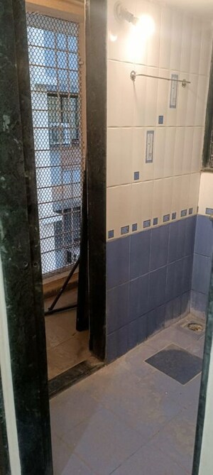Bathroom in 1 BHK Apartment at Puranik City, Kasarvadavali – for Rent