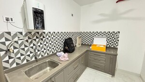 Kitchen in 2 BHK Apartment at Wadgaon Sheri – for Rent