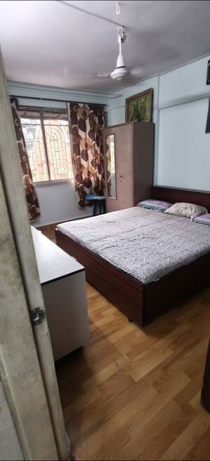 Bedroom in 2 BHK Apartment at Nilanjana CHS, Malad West – for Rent
