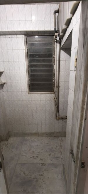 Bathroom in 2 BHK Apartment at Nilanjana CHS, Malad West – for Rent
