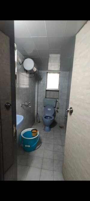 Bathroom in 2 BHK Apartment at Lok Upvan Apartment Phase 2, Vasant Vihar – for Rent