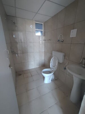 Bathroom in 2 BHK Apartment at Ashadeep Ananta Jagat, Alwar Bypass Road – for Rent