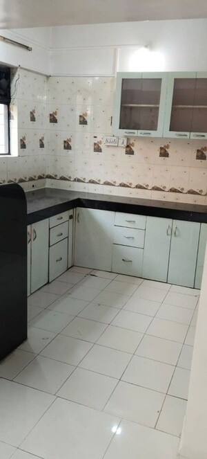 Kitchen in 2 BHK Apartment at Mokate Heritage, Kothrud – for Rent