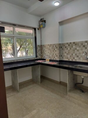 Kitchen in 1 BHK Apartment at Laxmina Krishna Niwas, Chembur – for Rent