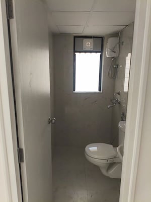 Bathroom in 1 BHK Apartment at Runwal Gardens Phase I, Dombivli East – for Rent