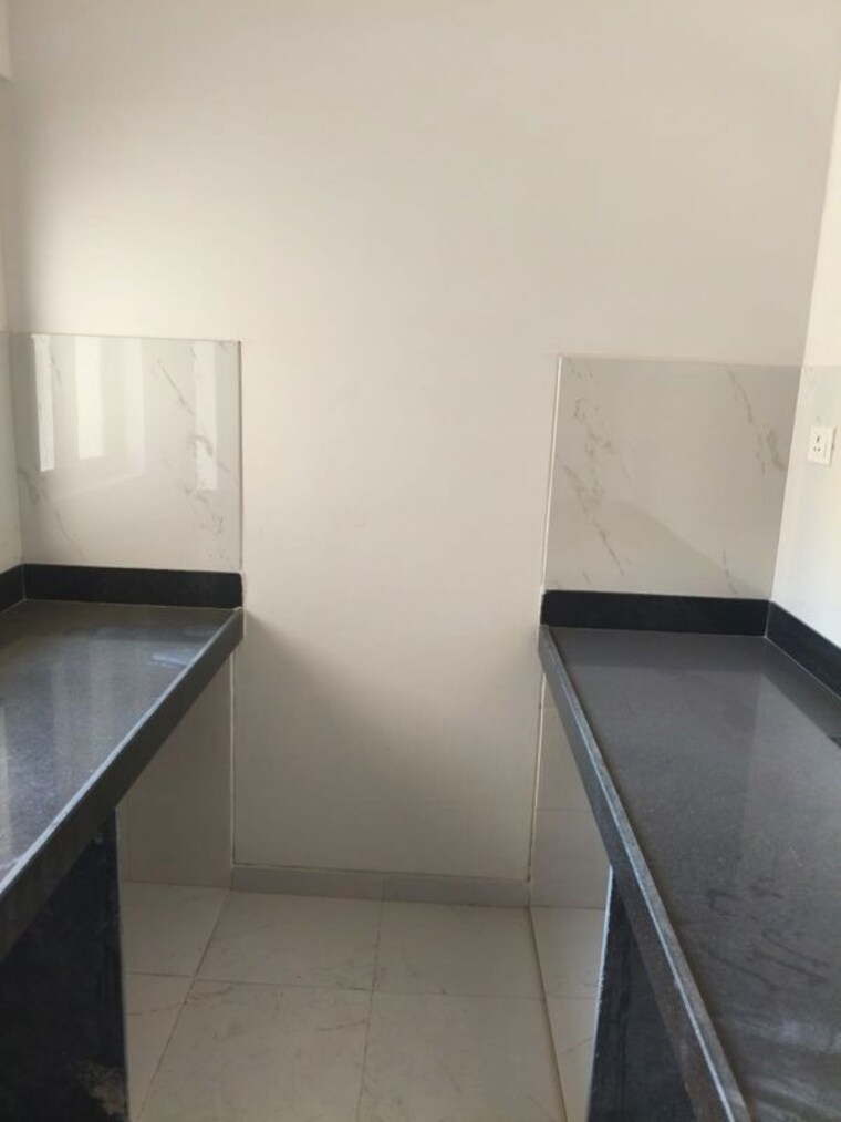 Kitchen, runwal-gardens-phase-i 1 Bedroom 650 Sq.Ft. Apartment In Dombivli East Thane 10000021