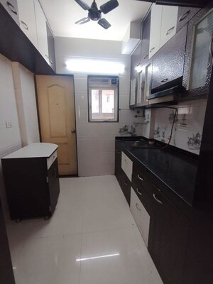 Kitchen in 1 BHK Apartment at JVM Aroma, Kasarvadavali – for Sale