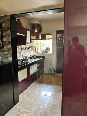 Kitchen in 1 BHK Apartment at Raunak Bliss B1, Ghodbunder Road – for Rent