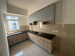 Kitchen in 2.5 BHK Builder Floor at Smart World Orchard, Sector 61 – for Rent