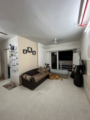 Living Room in 2 BHK Apartment at Romell Amore, Andheri West – for Rent