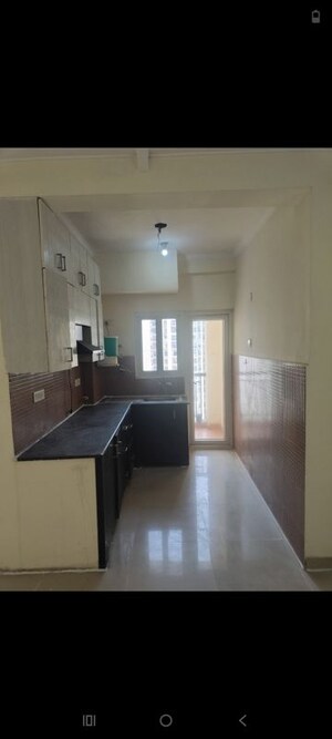 Kitchen in 2.5 BHK Apartment at Antriksh Golf View, Sector 78 – for Rent