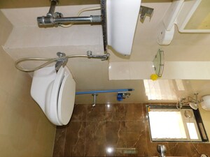 Bathroom in 1 BHK Apartment at Sharda Edifice Celestial, Bhandup West – for Rent