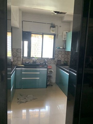 Kitchen in 2.5 BHK Apartment at Neelkanth Greens, Manpada – for Sale